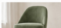 Silla tapizada en tono verde claro